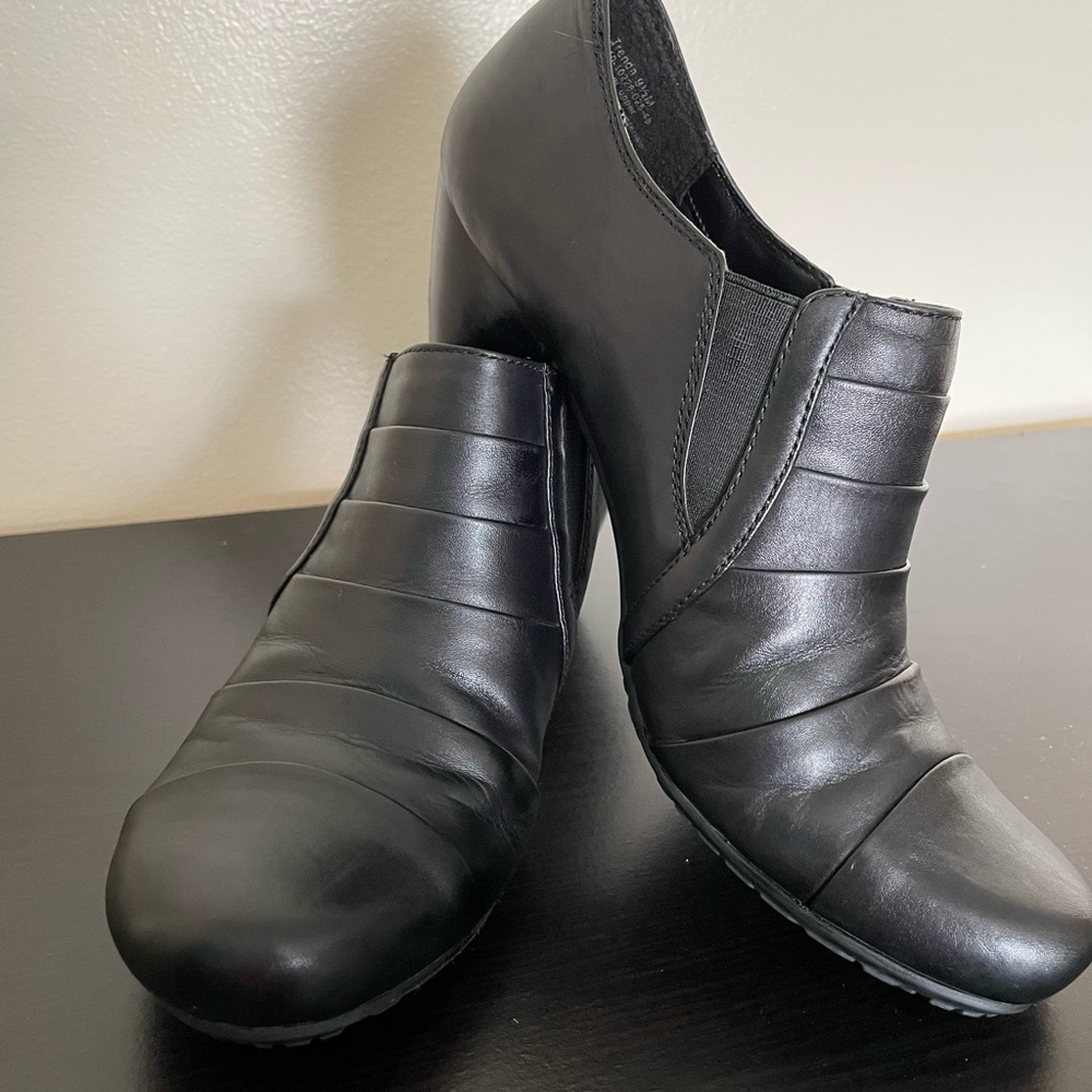 Black leather booties by Bear Traps